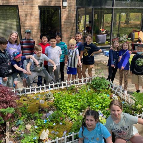 Children near a fairy garden