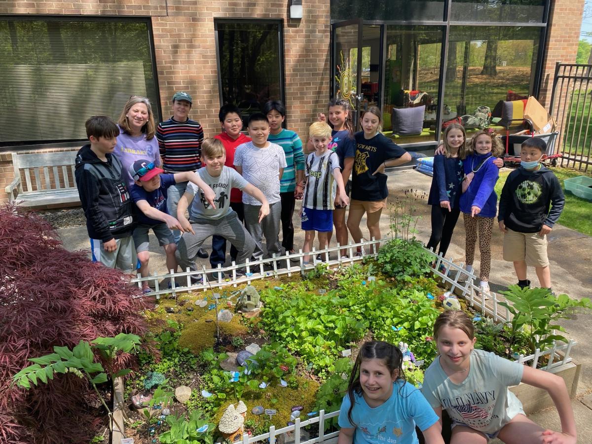 children near a fairy garden 