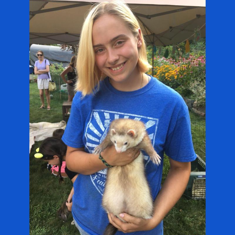 Xen holding a live ferret